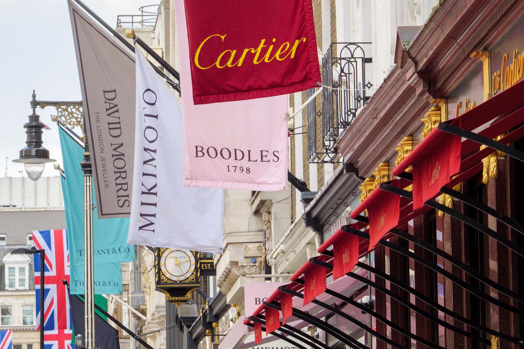 Upmarket shop signs on Bond Street in London’s Mayfair neighborhood. 